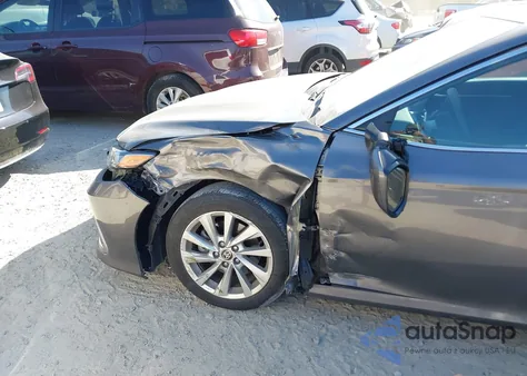 2021 Toyota Camry Le from USA, damaged, VIN 4T1C11AK5MU552362